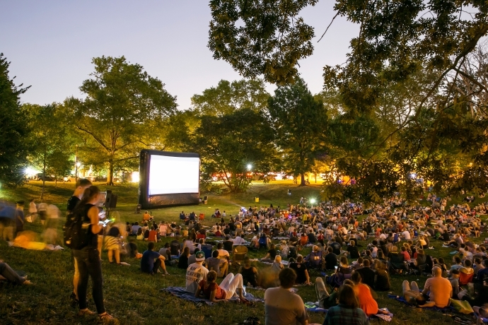 A crowd gathers in Clark Park for a movie night in 2016