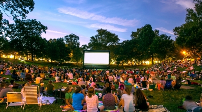 A crowd enjoying a movie in Clark Park 