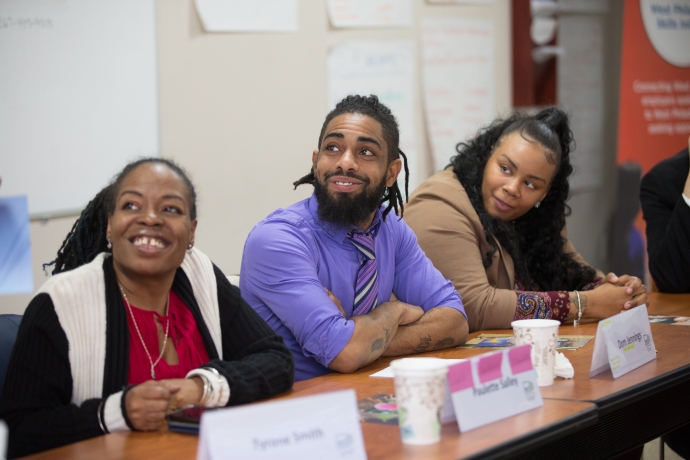 Three participants of the West Philadelphia Skills Initiative during a training in December of 2019
