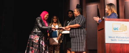 WPSI graduates on stage receiving awards 
