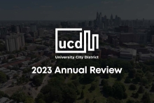 2023 Annual Review over a drone image of University City