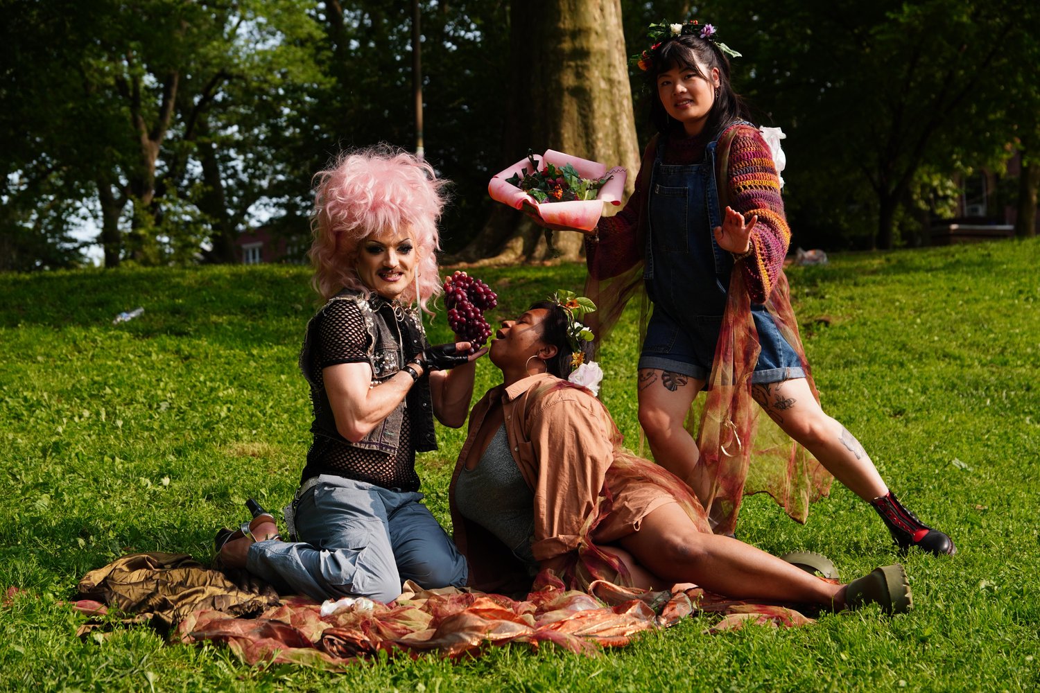 3 People performing in a performance of a Midsummer's Night Dream