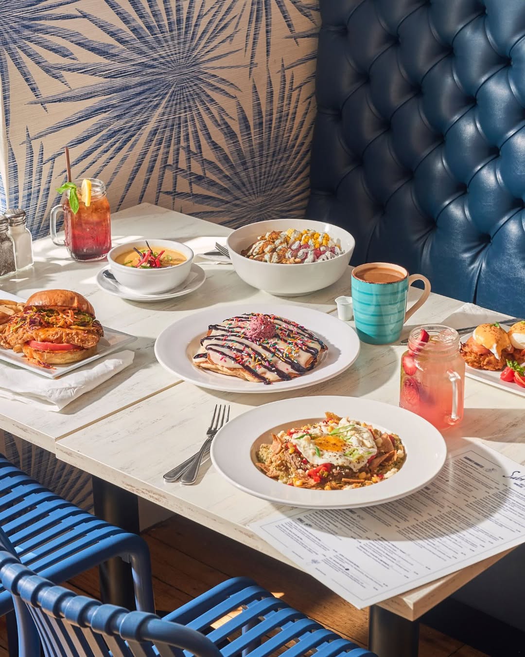 A delicious looking spread of food on a table at Sabrina's Cafe