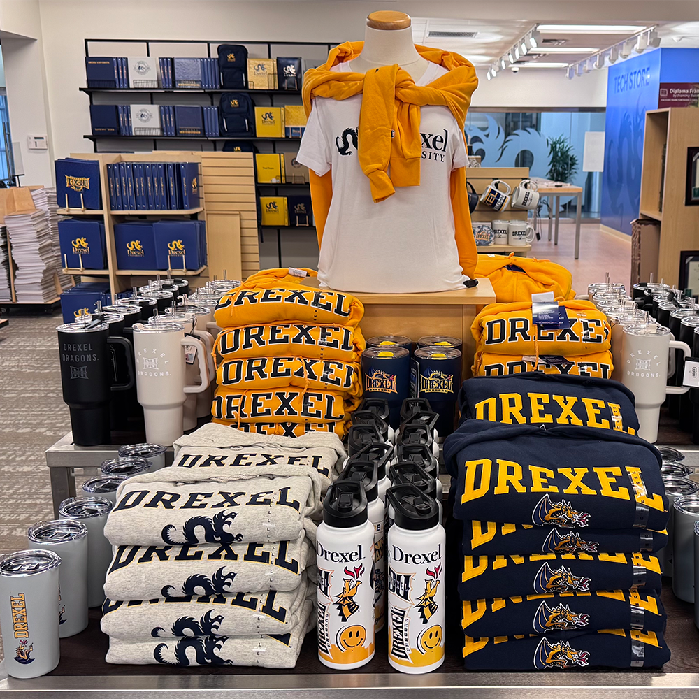 Folded piles of merchandise at the Drexel Rally House