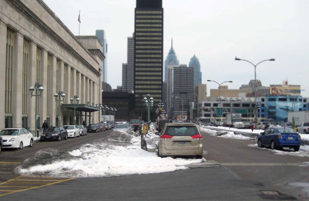A view of The Porch at 30th Street Station before it was built, showing the original parking lot.