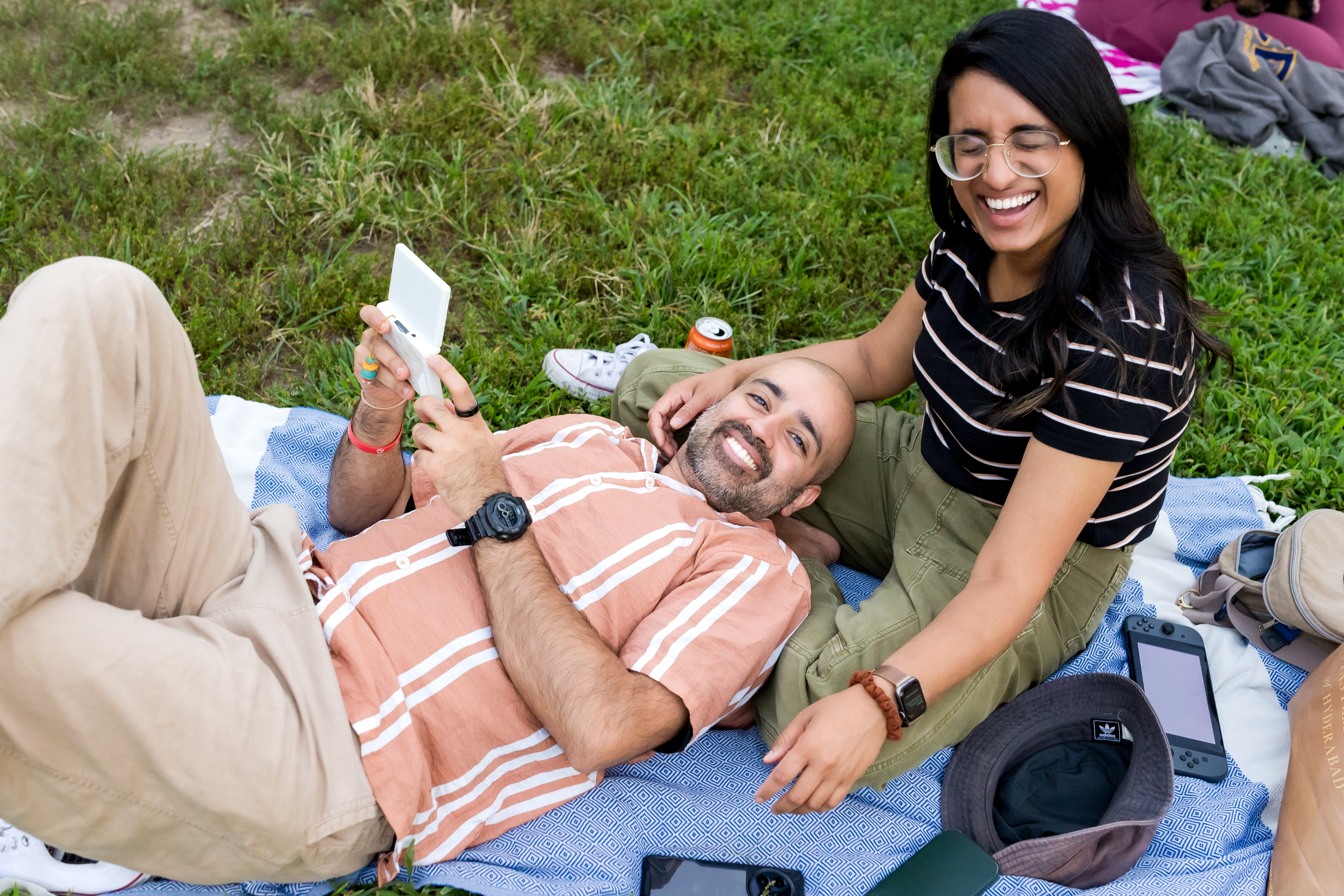 A crowd enjoys an outdoor movie at Movies in Clark Park.