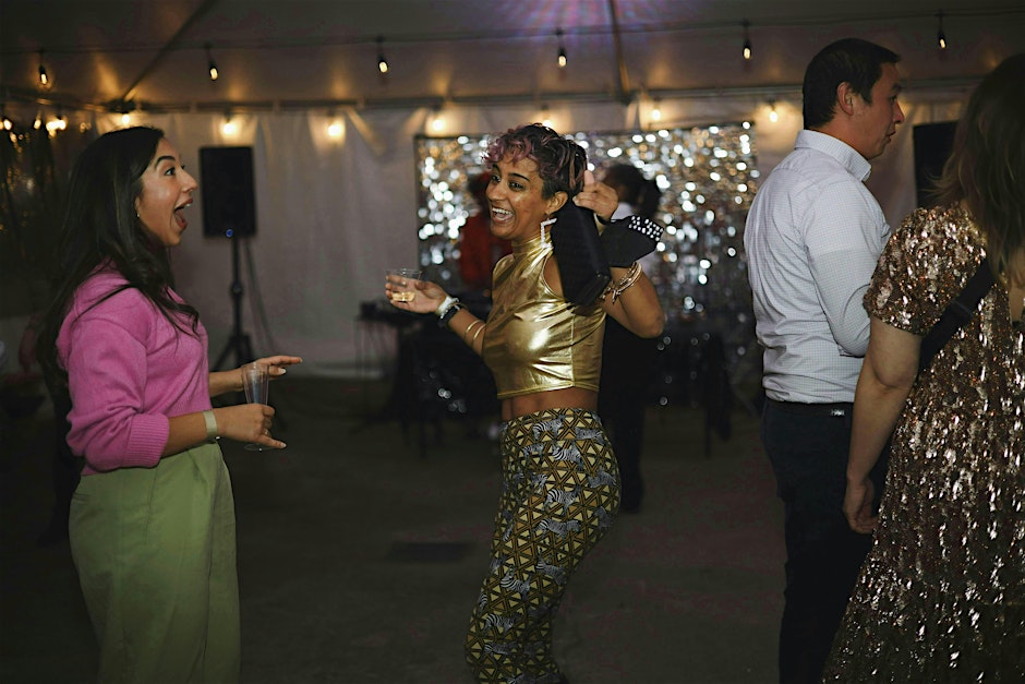 https___cdn.evbuc.com_images_1134240103_18808313997_1_original Two people smiling and dancing on a dance floor