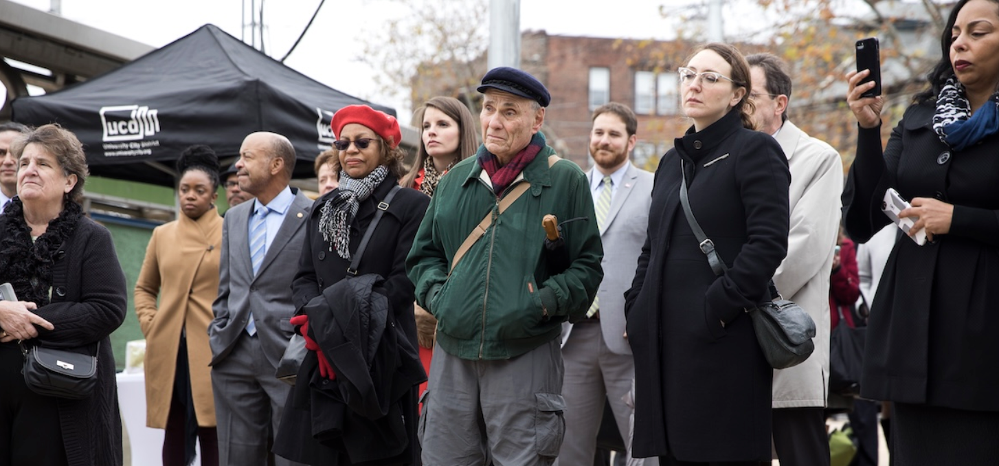 Civic activist Barry Grossbach stands among a crowd.