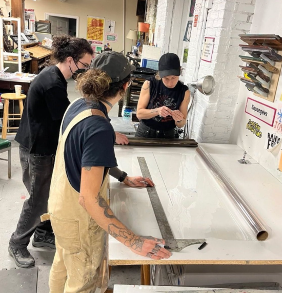 Soap Box Philly workers in the print making studio