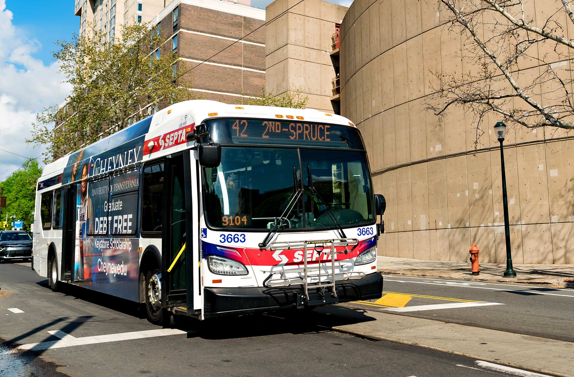 A SEPTA bus drives on the street.