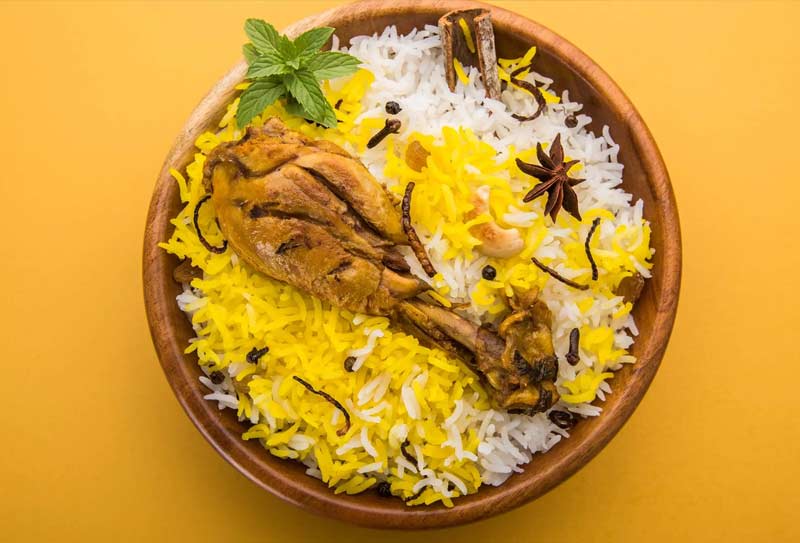 Desi Chaat House chicken and rice dish